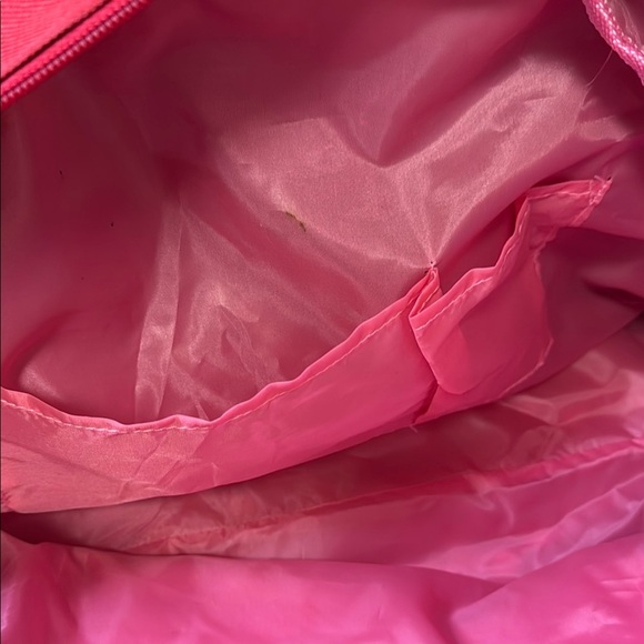 Red and Brown Travel Bag with Adjustable Strap and Sturdy Design - Picture 9 of 10